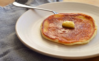 Butter melting on fluffy scotch pancakes